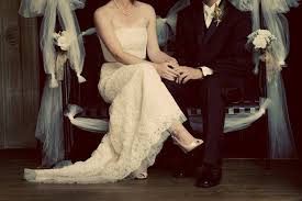 Bride and groom seated together